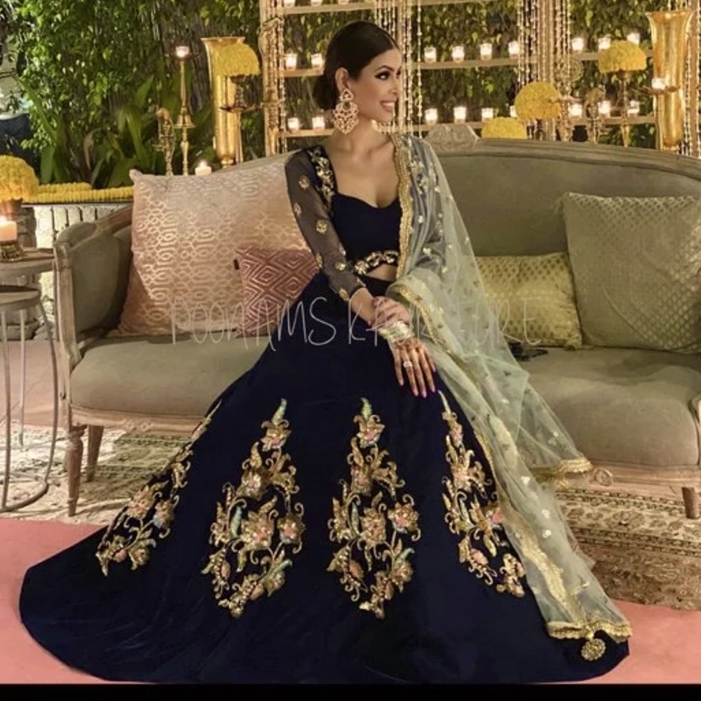 Poonams Kaurture official authentic diya lehengha emerald green lengha